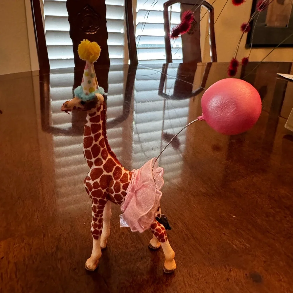Zebra, tiger, elephant, and Giraffe Figurines